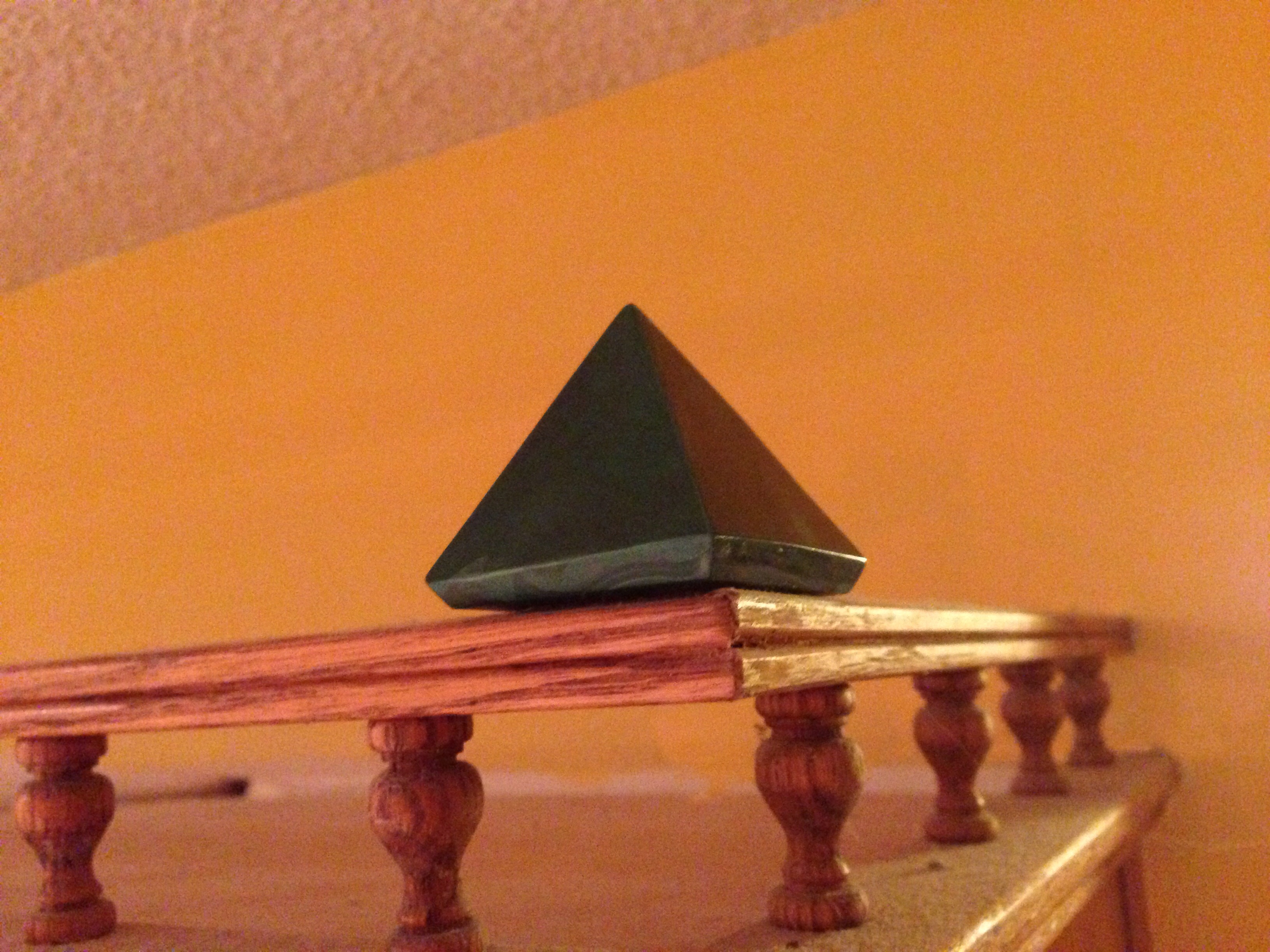 Raising House Vibrations with Pyramids